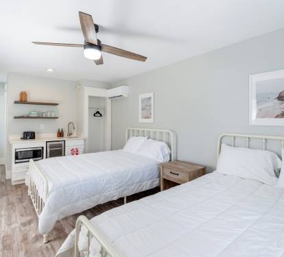 Two queens and kitchenette in the upstairs casita