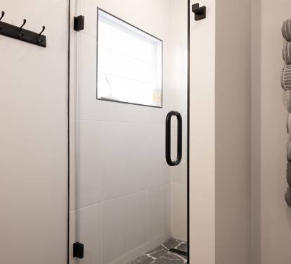 Main Floor Bathroom. 36x48 walk in shower with dual shower heads.