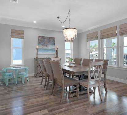 Spacious Waterfront Dining Area for Family Dinners & Kids Table for Little Ones