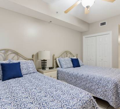 Our second bedroom is large enough for 2 queen beds. 