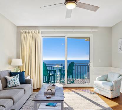 Floor to ceiling sliding glass door provides unparalleled views of the ocean from your living room.