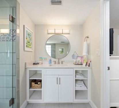 ?? "Indulge in Luxury. The master bath features a spacious soaker tub, a walk-in tiled shower, and modern amenities—your personal spa experience at After Dune Delight." ???