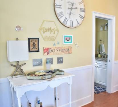 Half bath and cocktail table off the kitchen