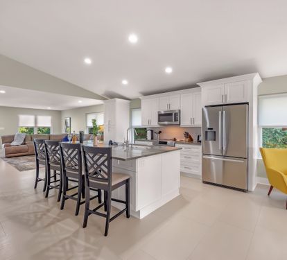 Kitchen has an oversized bar