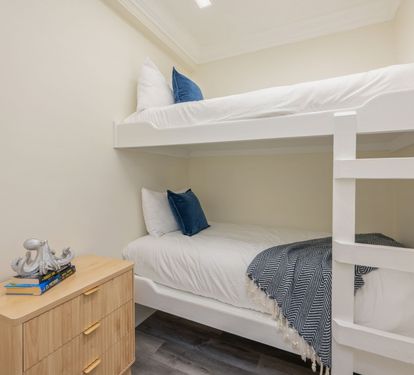 Twin over twin bunk room in 1st floor living area