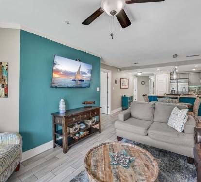 Beachy Vibes + Cable TV - Catch a movie, unwind,
or simply enjoy the breezy beach-inspired decor.