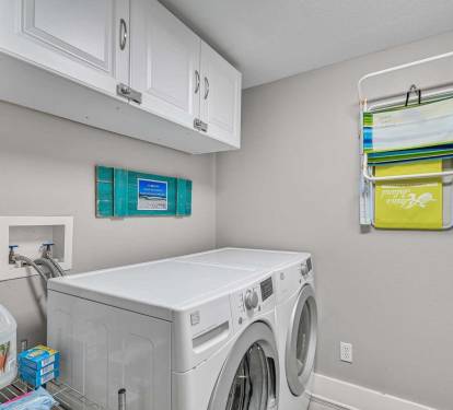 In-Unit Laundry for Easy Beach Days - Full-size
washer and dryer