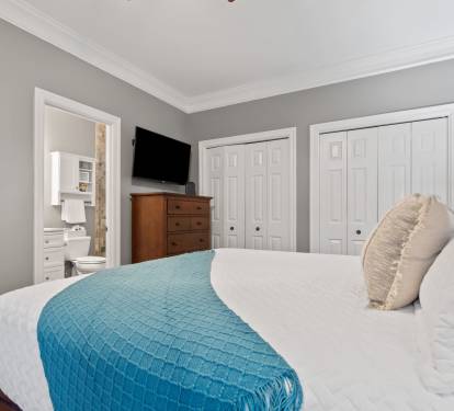 Master bedroom with king bed on main level