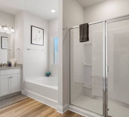 Bathroom 2: Ensuite A perfect balance of convenience and relaxation with a shower and soaking tub