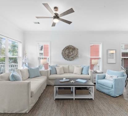 Relax in this beautiful coastal-themed home, complete with brand-new furniture.
