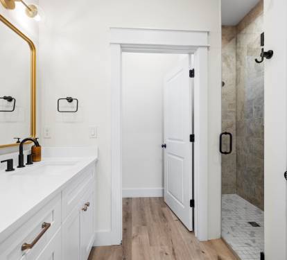 1st Floor Bathroom 2 has a double vanity, separate water closet and custom walk in shower
