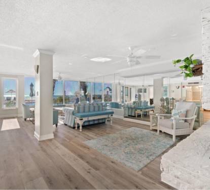 Common area/social room overlooking the pools and Gulf