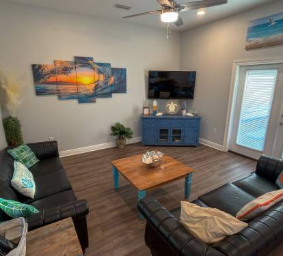 Whether it’s rainy-day movies or post-beach relaxation, the main lounge easily becomes everyone’s favorite hangout spot.