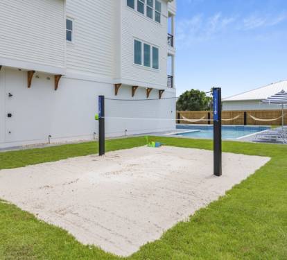 Spike, serve, and dive—our sand volleyball court is ready for your game!
