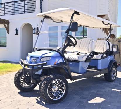Complimentary six-seater, street-legal golf cart.
