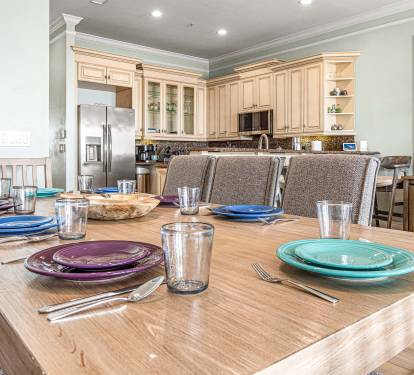 Dining area and fully stocked kitchen.