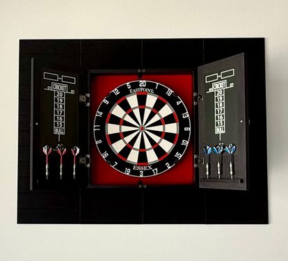 Take on the group in a round of darts on the built-in board — scoreboards included so bragging rights are official.
