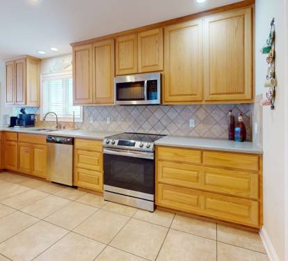 Large kitchen with electric range