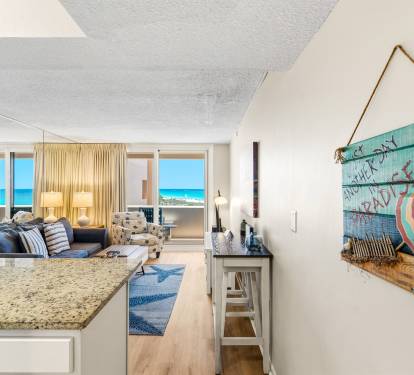 Coastal decor and breathtaking ocean views create a warm and inviting atmosphere. 