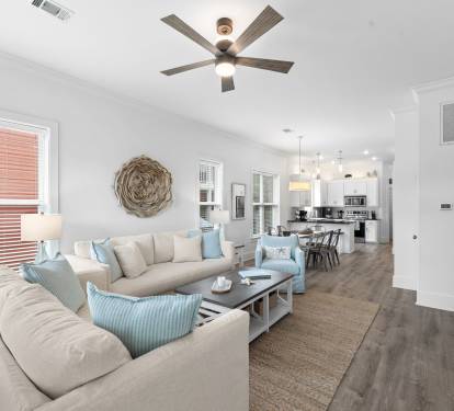Sunnyside has an open concept living room, dining area and kitchen.