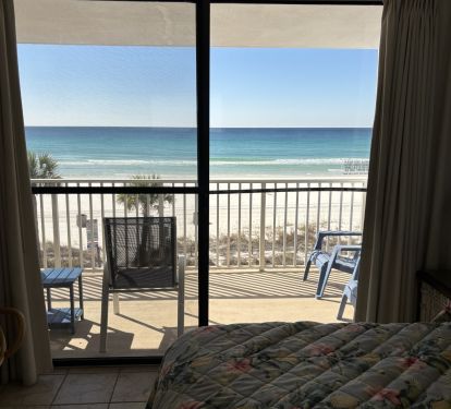 View of beach from bedroom