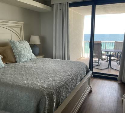 Master with Sliding Glass Door access to patio
