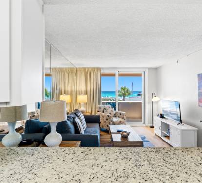 Coastal decor and breathtaking ocean views create a warm and inviting atmosphere. 