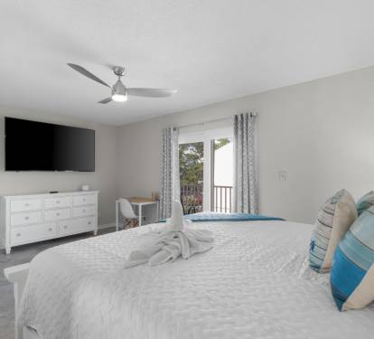 Master bedroom with King bed and Wi-Fi enabled TVs