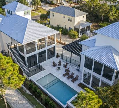 Gather around your private pool, hot tub, and glowing fire bowl after a day at the beach at this peaceful retreat featuring a spacious 4-bedroom main house and charming 2-bedroom guest house—perfect for unforgettable group getaways with family and friends