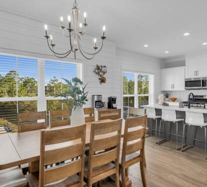 When you book a place that sleeps eight - the dining table needs to accommodate that many as well.   Enjoy a meal or family game night at our large dining table with room for everyone.   Need more -there's also seating at the island.