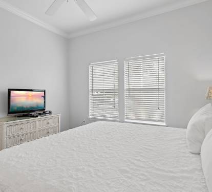 Well-lit condo has 10' ceilings throughout