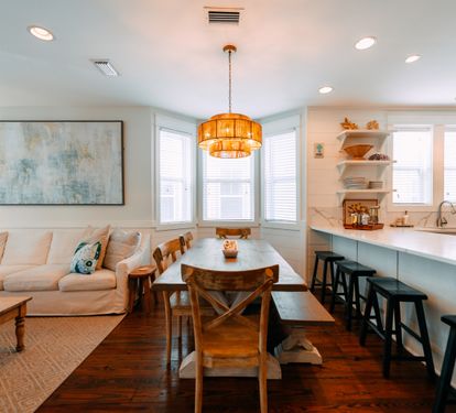 Kitchen and den area connect with plenty of room for your large group