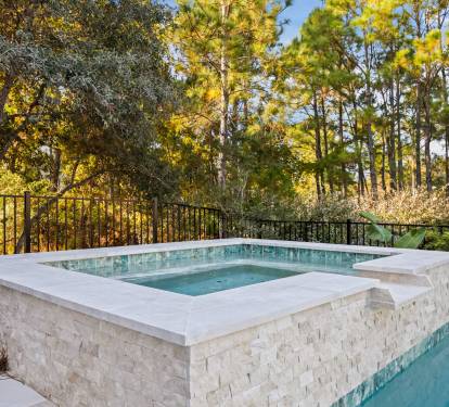 Private hot tub spa with poolside views, included with your fully private pool and outdoor living space—ideal for relaxing evenings and year-round enjoyment.