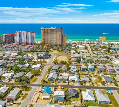 Just a short 7 minute walk to the sandy white beach!