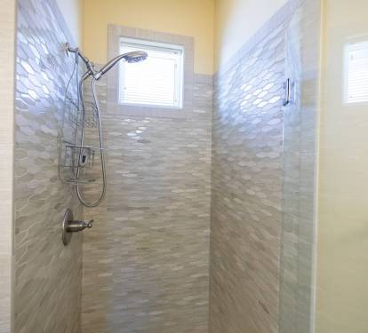 Large walk-in shower in Master Bath.  Features removable, hand-held shower wand.