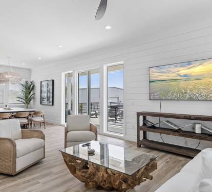 Cozy living area with a large Smart TV, and comfortable sofa 