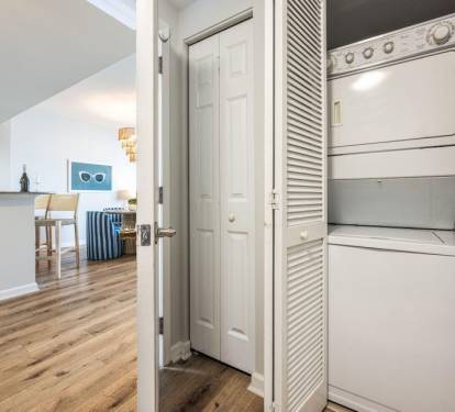 Convenient in-unit laundry tucked away, making longer stays feel effortless.