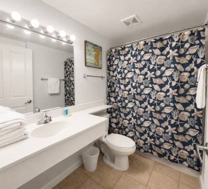 This bathroom is connected to bedroom #3, and there is a door off the kitchen as well.