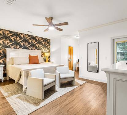 The parents' retreat. A massive master suite with a sitting area, king bed, and ensuite bath so the grown-ups can feel genuinely pampered.