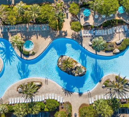 A resort-quality lagoon pool steps from your door. Zero-entry for the little ones, plenty of room for everyone.