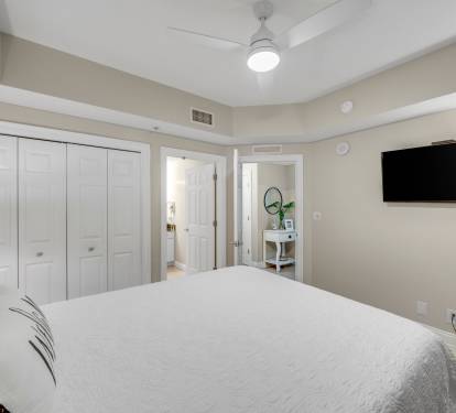 Bedroom with large TV and DirecTV