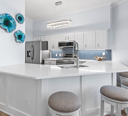 Stainless steel appliances and custom cabinetry
