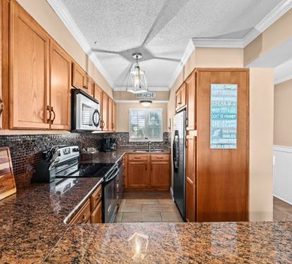 Kitchen is spacious with all your cooking and prep needs
