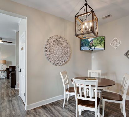 Cozy breakfast nook with wall décor and natural light