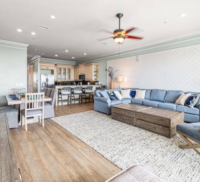 Living room, dining area, and kitchen.