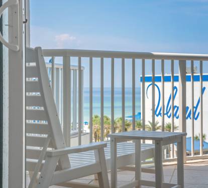Balcony railing overlooking the area, a nice spot to step out for fresh air.