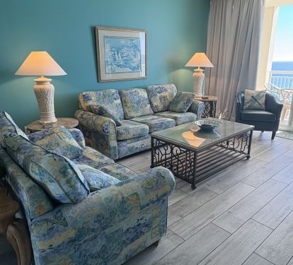Living Room has plenty of seating &amp; overlooks the Gulf of America.