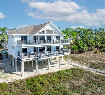 Spacious Deck Includes Covered Area for Both Sun and Shade When Viewing the Gulf