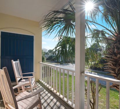 Balcony with rocking chairs and tropical views