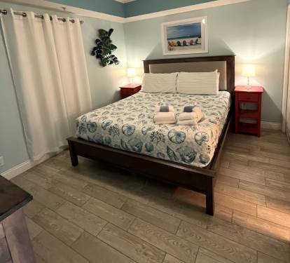 Wake up to paradise in the comfortable master bedroom.
